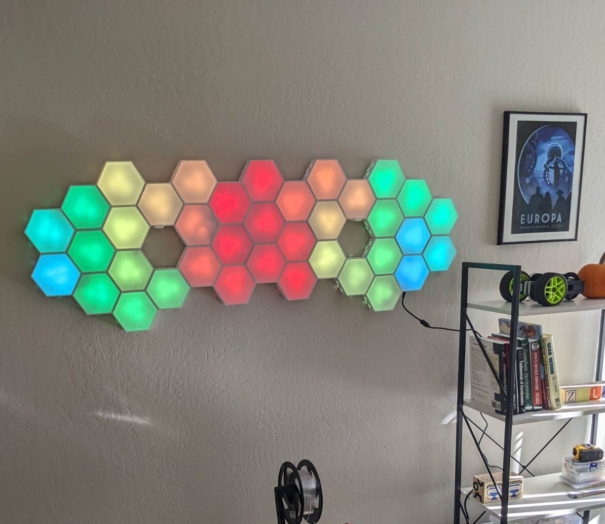 My custom wall art. I designed the physical parts in OpenSCAD, 3-d printed them, designed the pcbs, and finally assembled everything by hand.